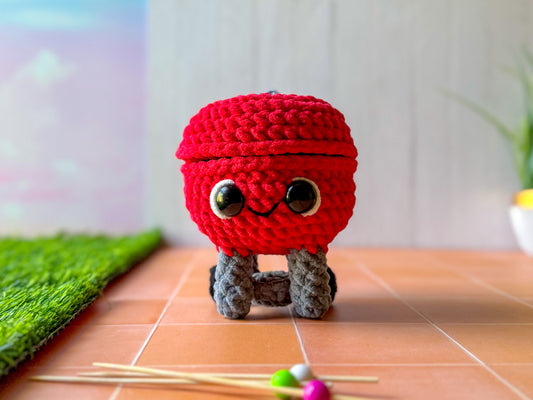 Front view of the Mini BBQ Grill crochet plush with lid closed.